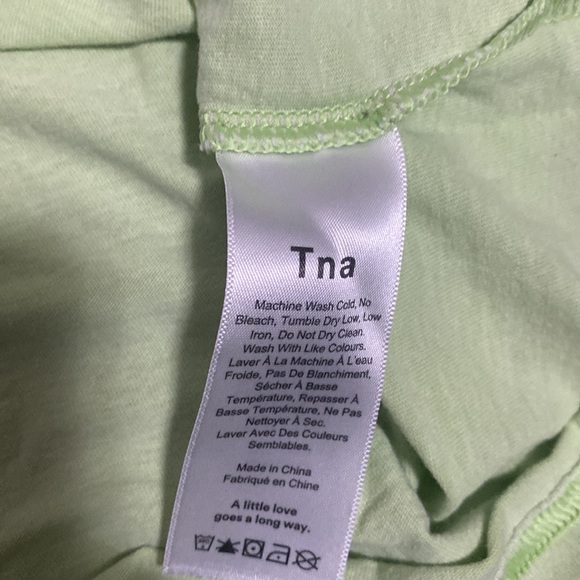 Selling the green Aritzia TNA green long sleeve, in size medium. - Picture 3 of 4